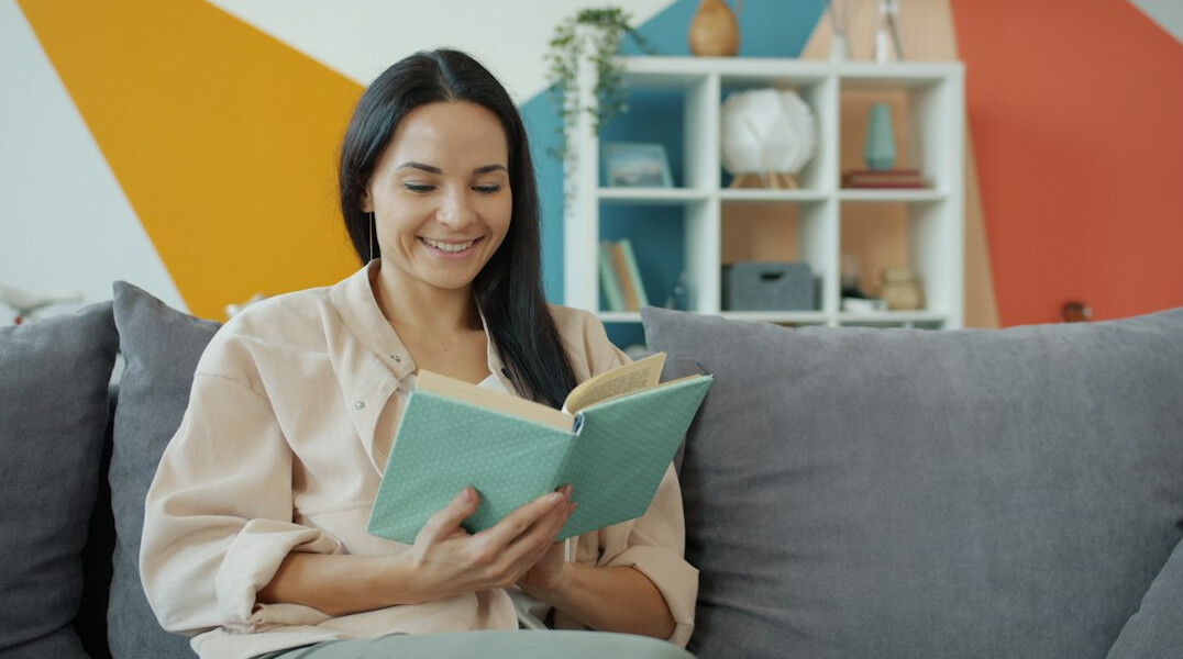 person reading health book at home