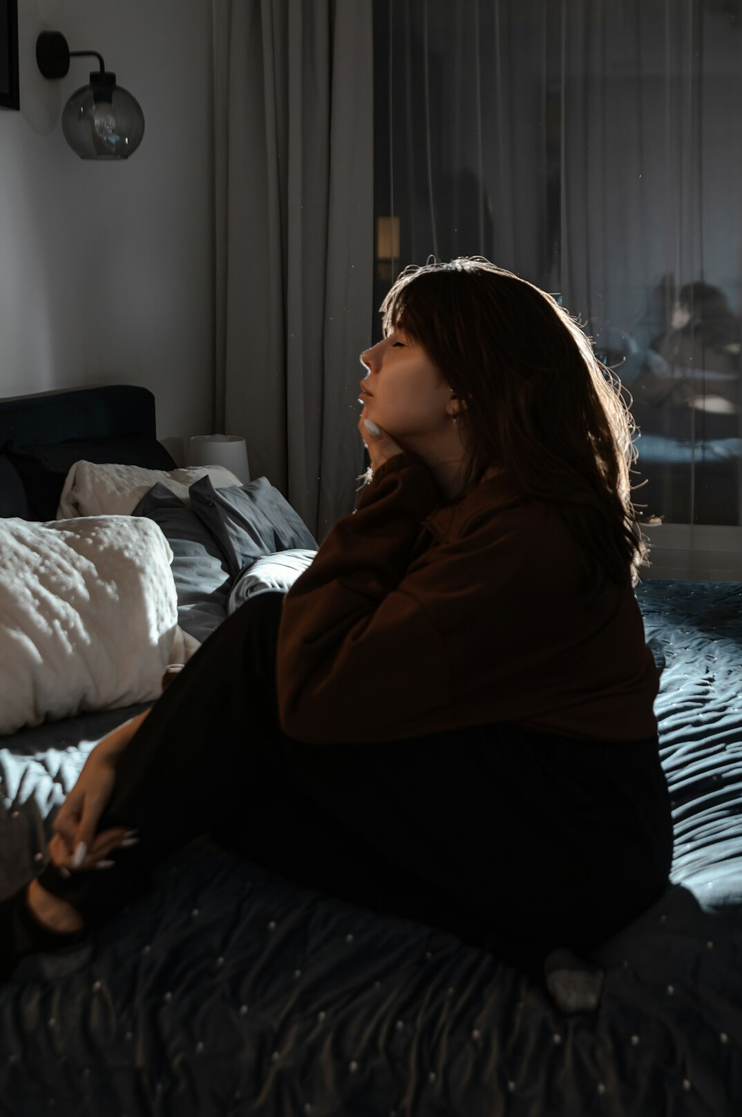 woman meditating in quiet room